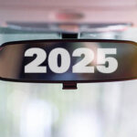 Rear view mirror inside the car with the date 2025