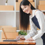 Small businesses SME owners female entrepreneurs check online orders to prepare to pack the boxes, sell to customers, sme business ideas online