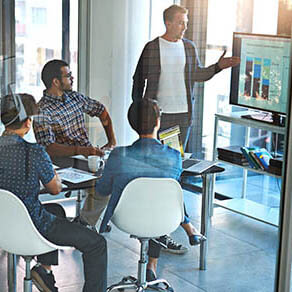 Shot of a young businessman giving a presentation in the boardroom