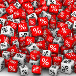 Red and white small square cubes with percent signs on them