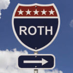 Road sign with word “ROTH” and an arrow pointing right