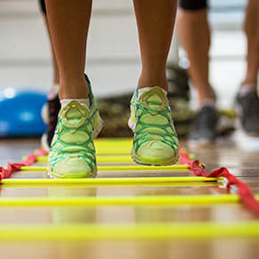 Close up of someone doing a ladder workout