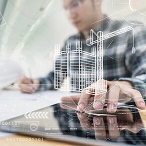 Engineer or Architech hand touching computer tablet interface with building design reality virtual technology at modern office on site. Building automation digital wireless control concept.