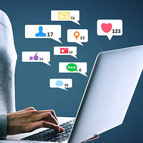 Close up of hacker hand using laptop with creative social media icons on abstract background. Like, network, technology and communication concept