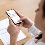 Taking Invoice Document Photo Using Phone Or Smartphone