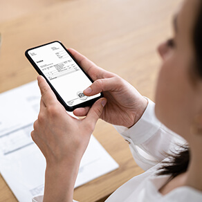 Taking Invoice Document Photo Using Phone Or Smartphone