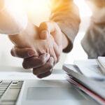 Close up of Business people shaking hands, finishing up meeting, business etiquette, congratulation, merger and acquisition concept