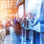 Interior of chemical factory or plant workshop with metal industrial manufacturing production equipment