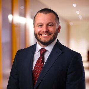Defocused corporate office conference room and corridor with glass walls background.