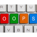 partial picture of keyboard with colored keys highlighting OOPS Typosquatters Fraud