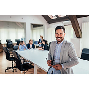 Man smiling at meeting