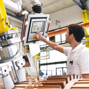 Labor technician looking and touching a technology computer