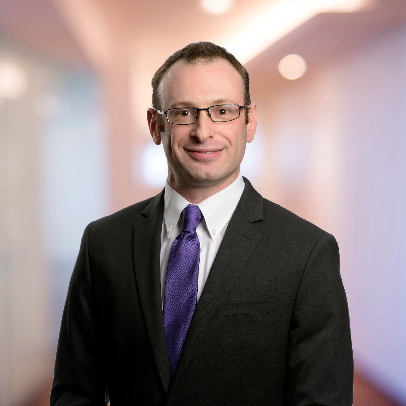 Headshot of Alex Nitka, Partner at Dannible & McKee