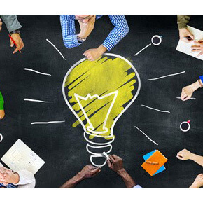 People around lightbulb idea