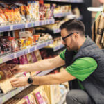 Man stocking shelves in a grocery store