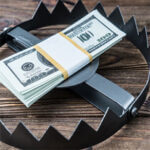 Money stacked up in the center of a ring/clamp