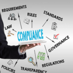 Compliance concept with man holding a tablet computer