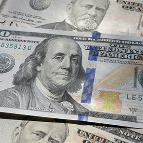 Hundred dollar bill and 50 dollar bill